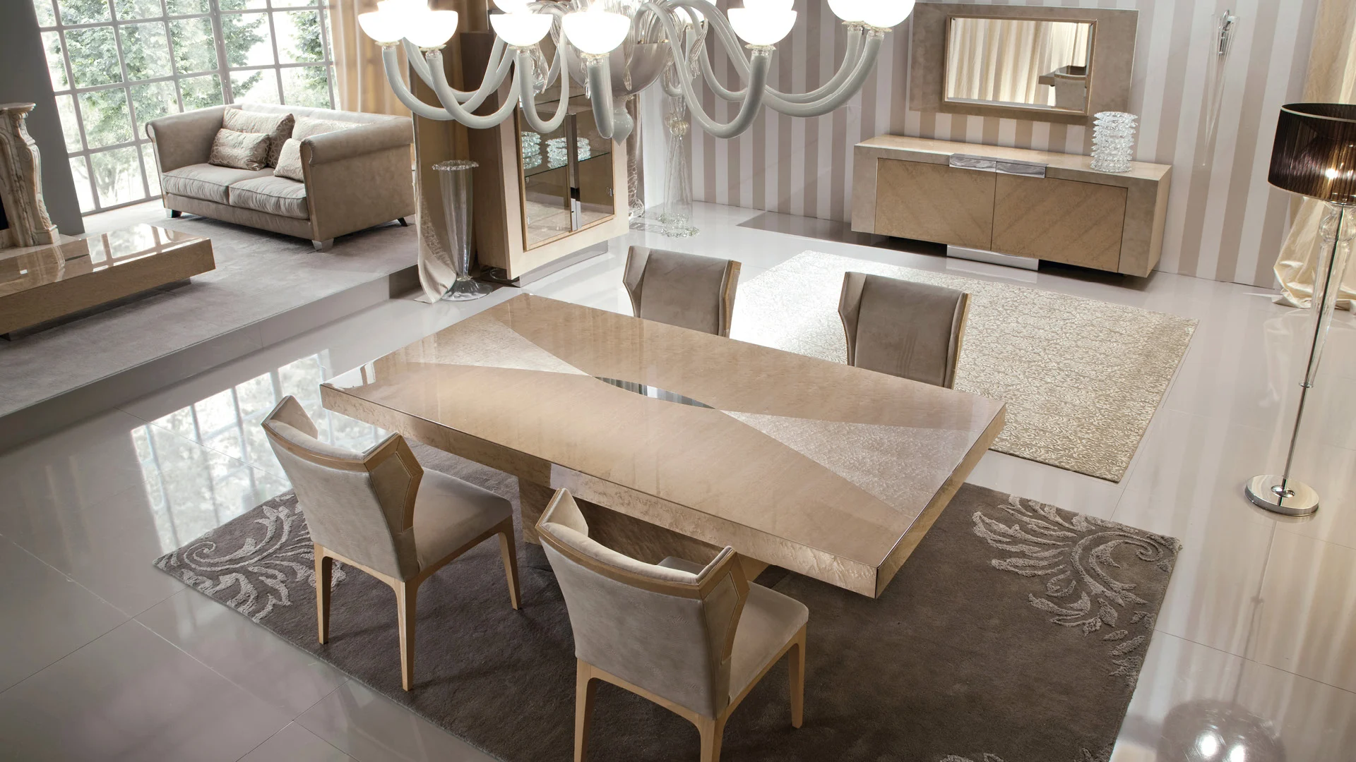A warm neutral dining room with a rectangular table, upholstered chairs and sideboard.