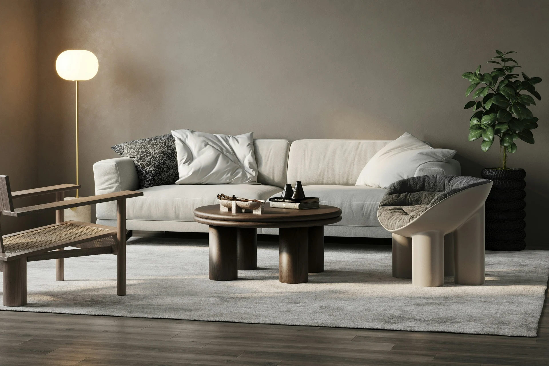 A softly curved sofa and round coffee tables in a neutral room.